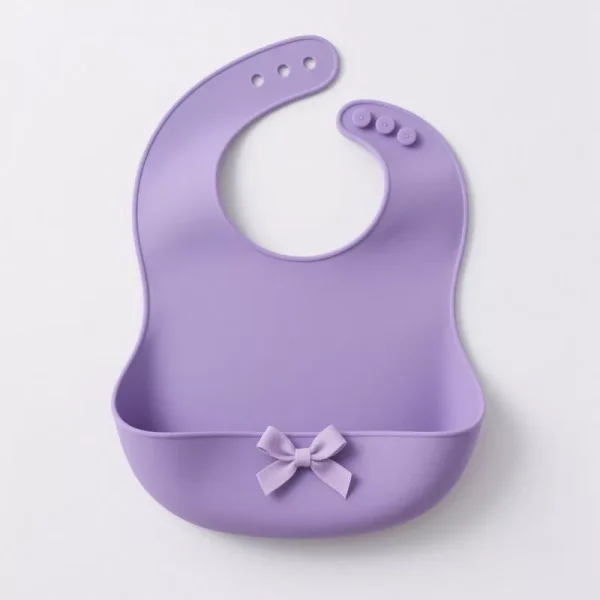 Purple silicone baby bib with built-in food catcher and bow decoration