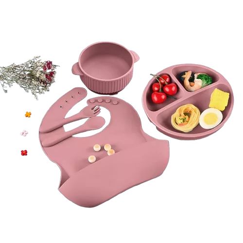 Pink Silicone Toddler Meal Set – Bib, Bowl, Spoon, and Suction Plate Isolated on Transparent Background