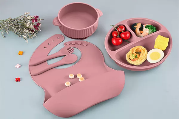 Dusty rose silicone suction plate set with bib, toddler utensils, snack bowl and floral decor
