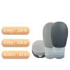 Silicone travel bottles in black and grey, showing size options 20ml and 65ml for organized liquid storage