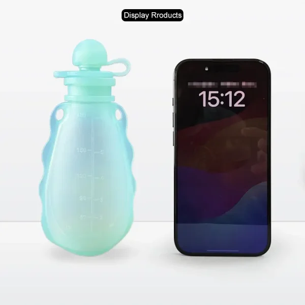 Silicone feeding pouch shown beside smartphone for size context.