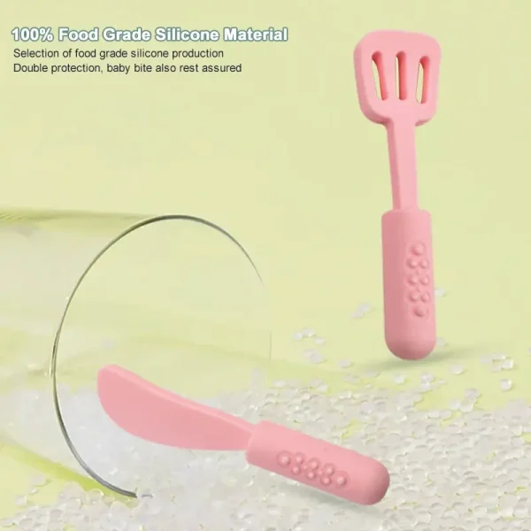 Pink silicone cookware play set with pot, pan, utensils, and bottle.