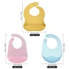 Silicone baby bibs in yellow, pink, and blue with food pocket design.