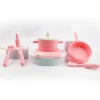 Pink silicone cookware play set with utensils.